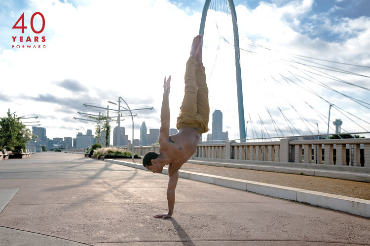 DBDT dancer leaping in the Arts District with 40 Years logo